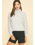 Treda Turtle Neck Knit Sweater